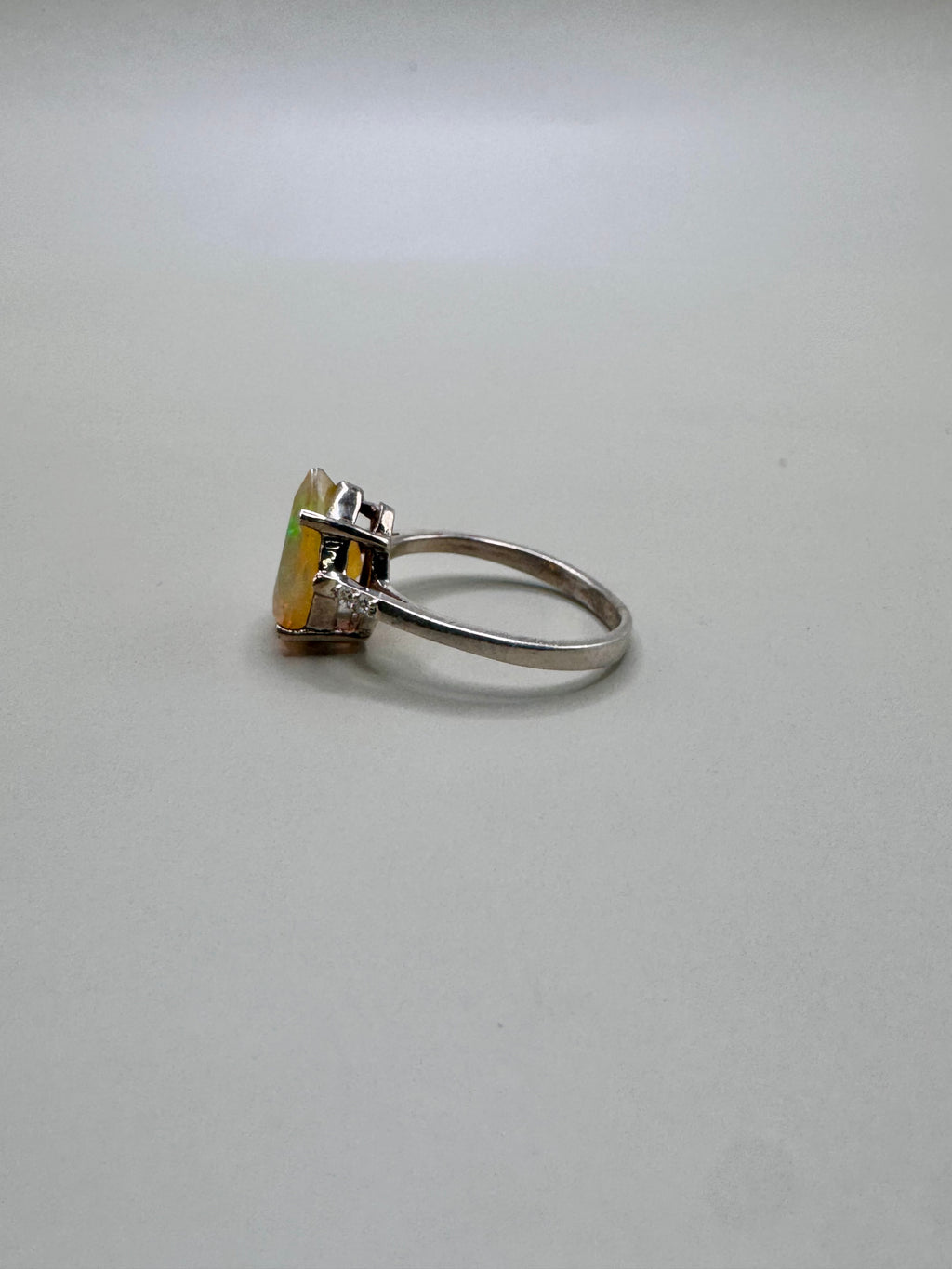 FIRE OPAL PEAR CUT AND DIAMONDS RING