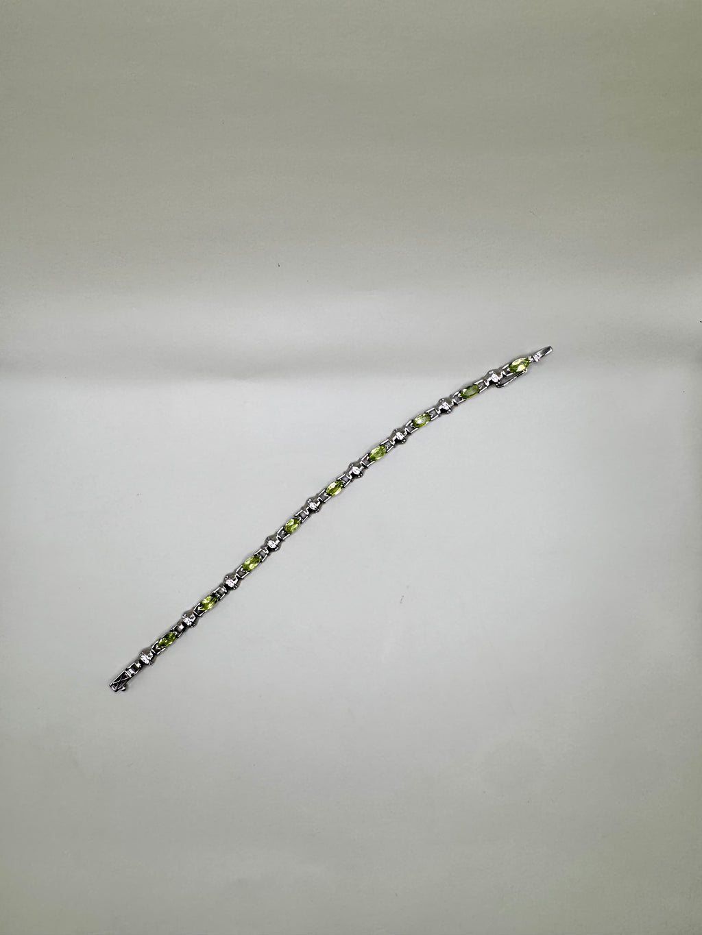 PERIDOT AND CLEAR QUARTZ BRACELET