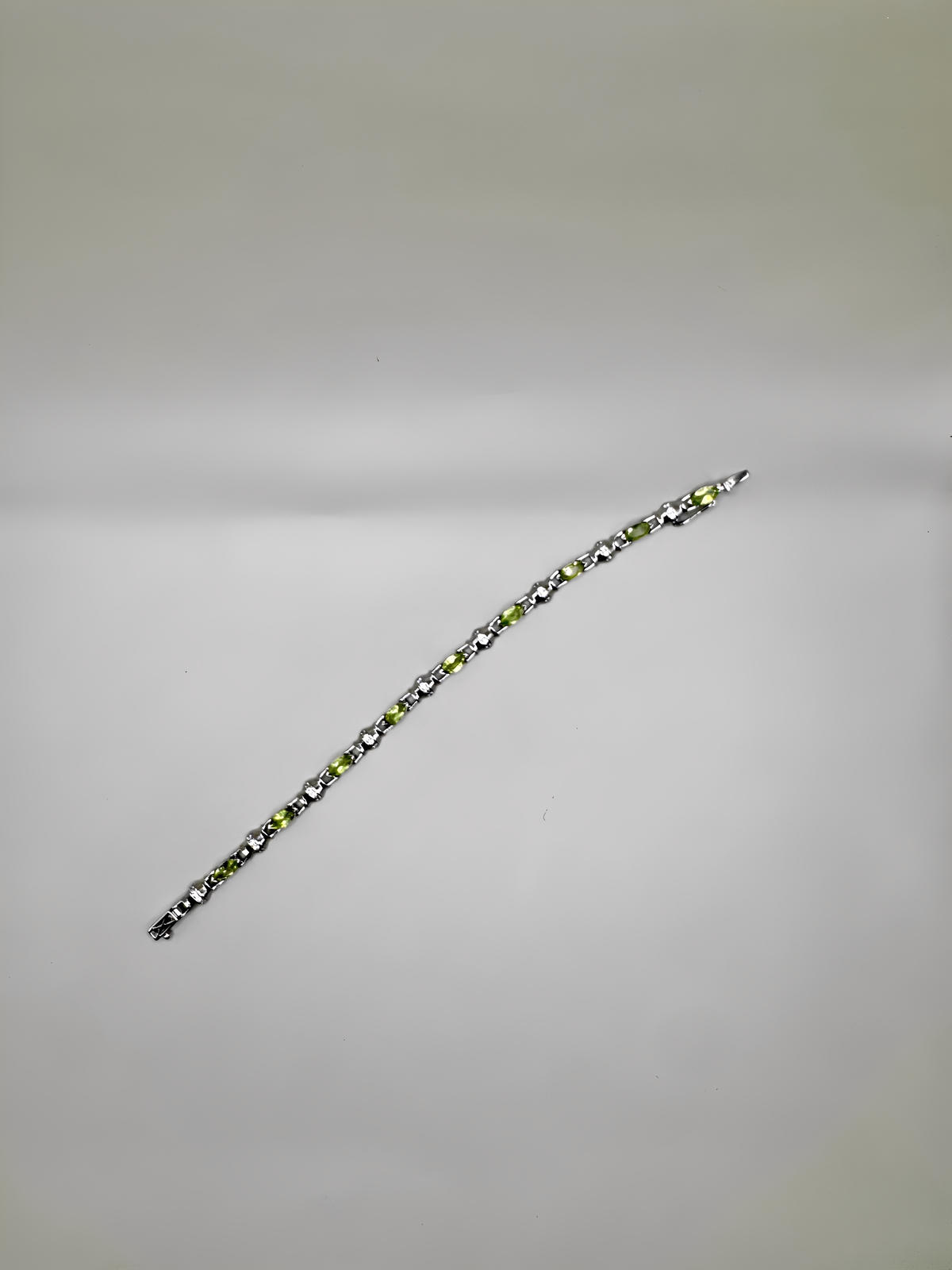 PERIDOT AND CLEAR QUARTZ BRACELET