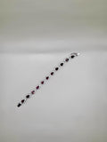 GARNET AND CLEAR QUARTZ BRACELET