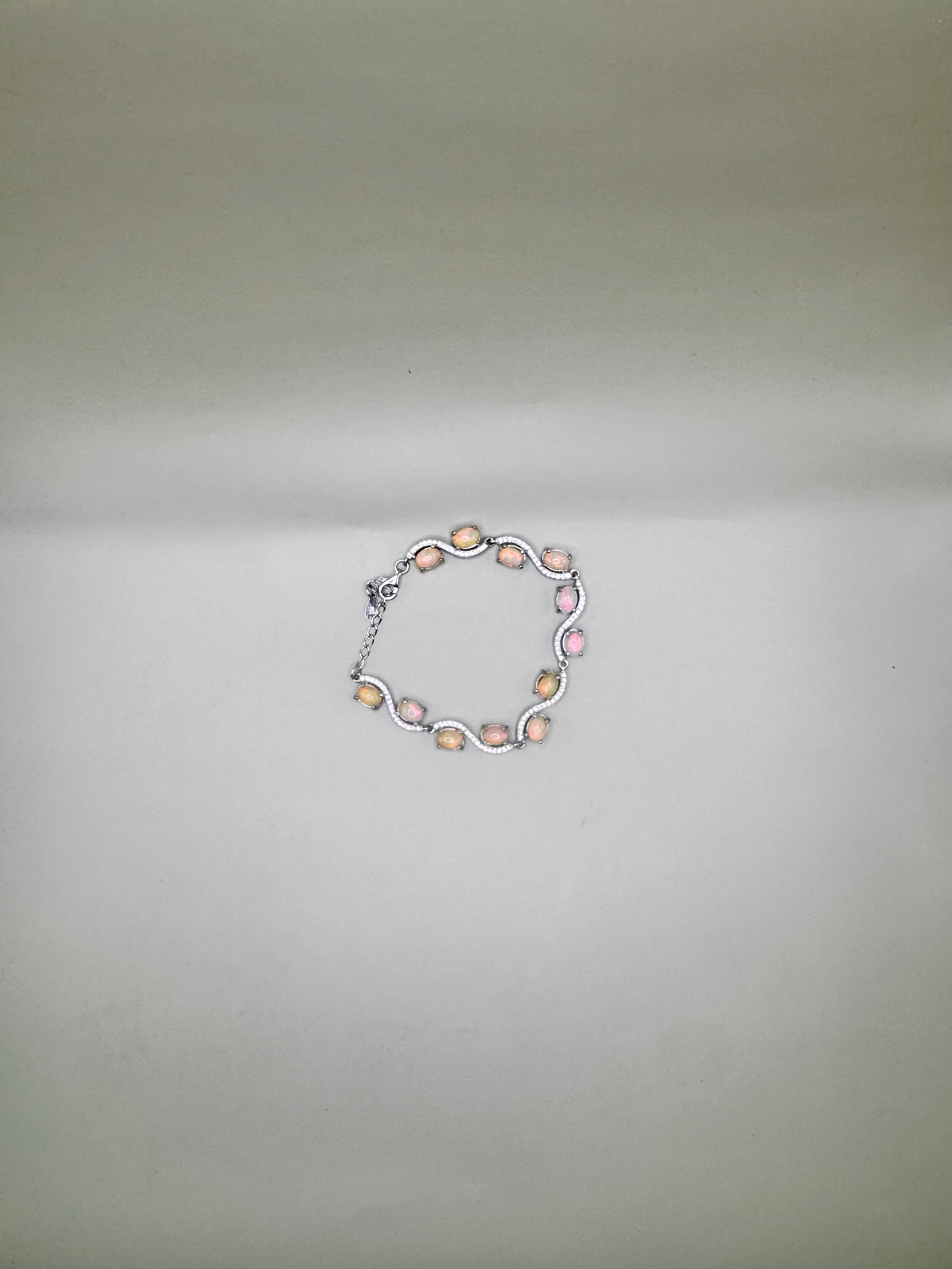 FIRE OPAL AND CLEAR QUARTZ BRACELET